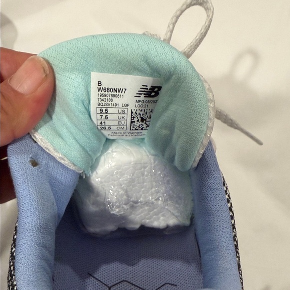 New Balance Women's White and Black Sneakers with Blue Accents - Picture 9 of 10